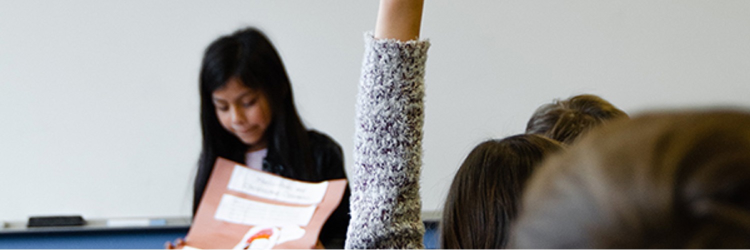 Students in a classroom during a presentation